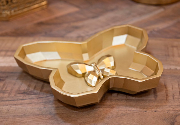 Arany színű, pillangó alakú tálca – dekoratív kiegészítő